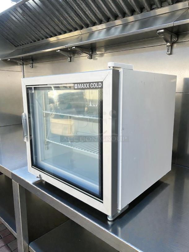 Maxx Cold MXM1-2FHC countertop glass door merchandiser freezer in excellent condition, tested and working.