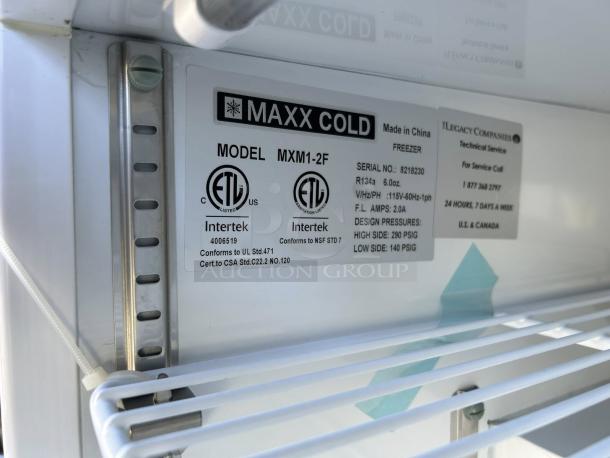Maxx Cold MXM1-2FHC countertop freezer, excellent condition. Model info and service label displayed. Verified working.