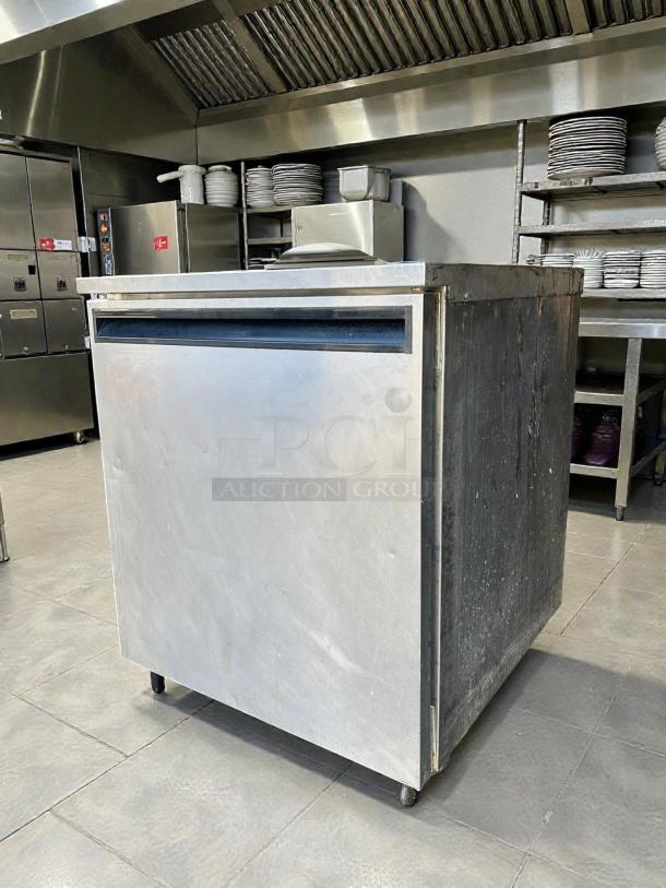 Delfield 407 undercounter refrigerator, 5.7 cu ft, single door, stainless steel, tested and working, 115v.