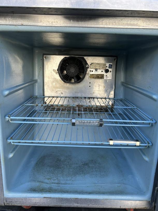 Delfield 407 undercounter refrigerator, 5.7 cu ft, tested, working, single section with door, visible racks, 115v.