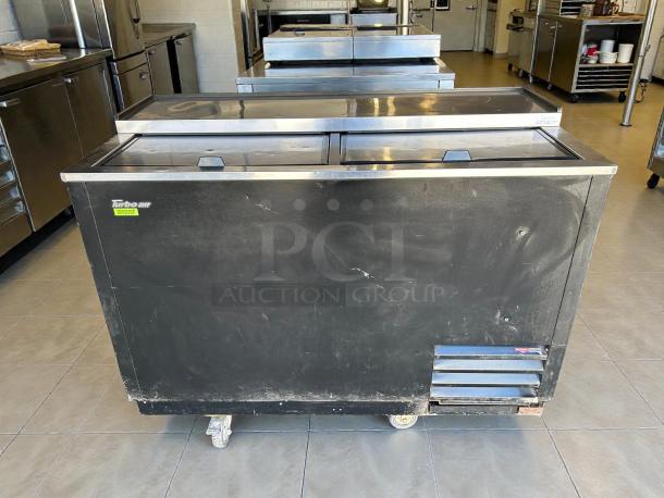 Turbo Air TBC-50SB-N6 50" black bottle cooler, holds 432 bottles, tested, working, sliding top doors, visible wear.