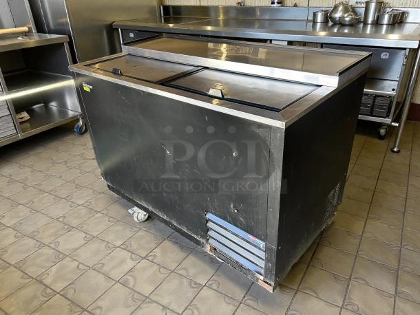 Turbo Air TBC-50SB-N6 bottle cooler, 50-inch, black, holds 432 bottles, tested working, slight surface wear, visible brand logo.