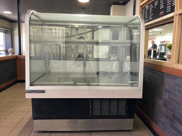 Schmidt 48” curved glass refrigerated bakery display case, great condition, tested and working, visible brand label.
