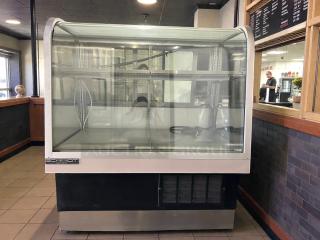 Schmidt 48” curved glass refrigerated bakery display case, great condition, tested and working, visible brand label.