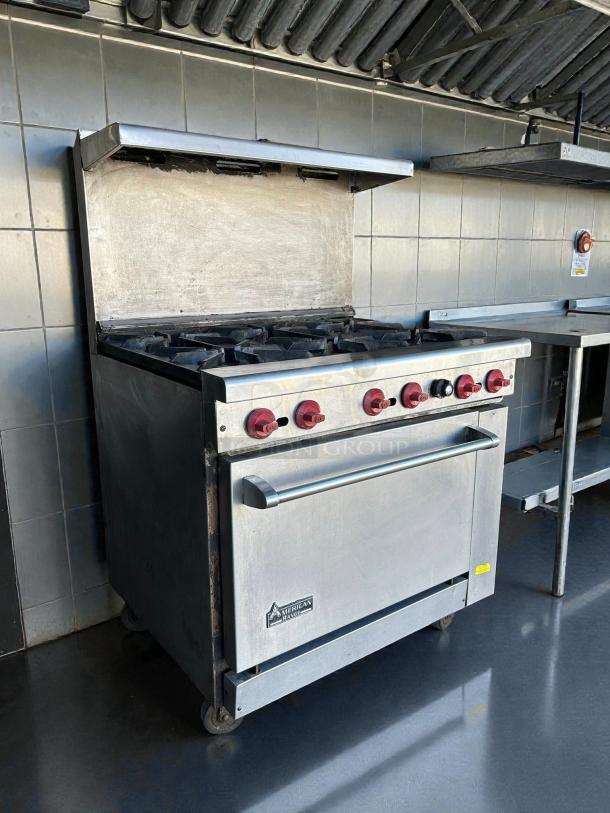 American Range AR-6-C 36" natural gas 6-burner range with convection oven, excellent condition, tested and working.
