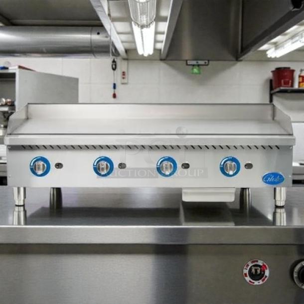 Globe GG48G 48" natural gas griddle with manual controls, stainless steel, countertop model, tested and working condition.