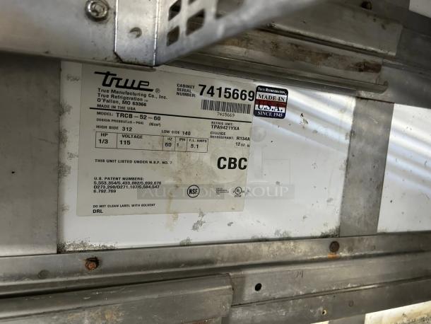 True TRCB-52-60-HC Chef Base label showing model, voltage, and NSF certification. Made in USA, excellent condition.