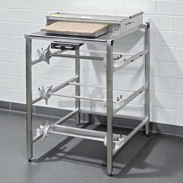 Heat Seal 104A Triple 20" Roll Film Wrapping Machine, tested and working, features extra wide floor design, excellent condition.