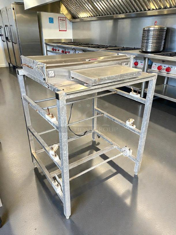 Heat Seal 104A Triple 20" Roll Film Wrapping Machine, extra wide, tested, working. Features sturdy frame, minor wear.