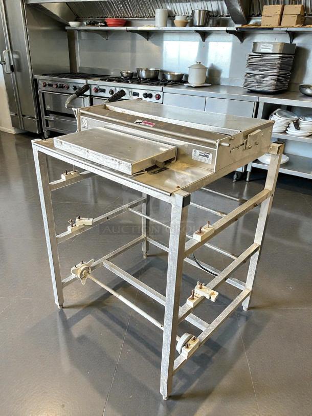 Heat Seal 104A Triple Roll Film Wrapping Machine, 20" width, stainless steel, tested, working condition, visible labels.