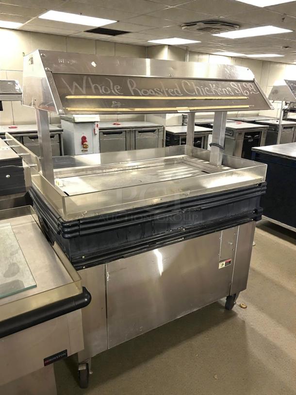 BKI MM-4 Heated Merchandiser Display, stainless steel, tested, working condition, labeled "Whole Roasted Chicken Shop."