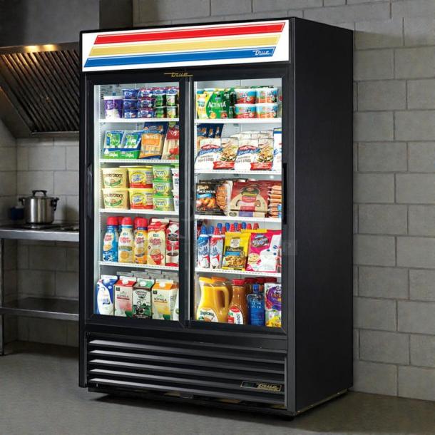 True GDM-45-HC-LD glass door merchandiser, 51 1/8", excellent condition, tested, black exterior, vibrant interior lighting.