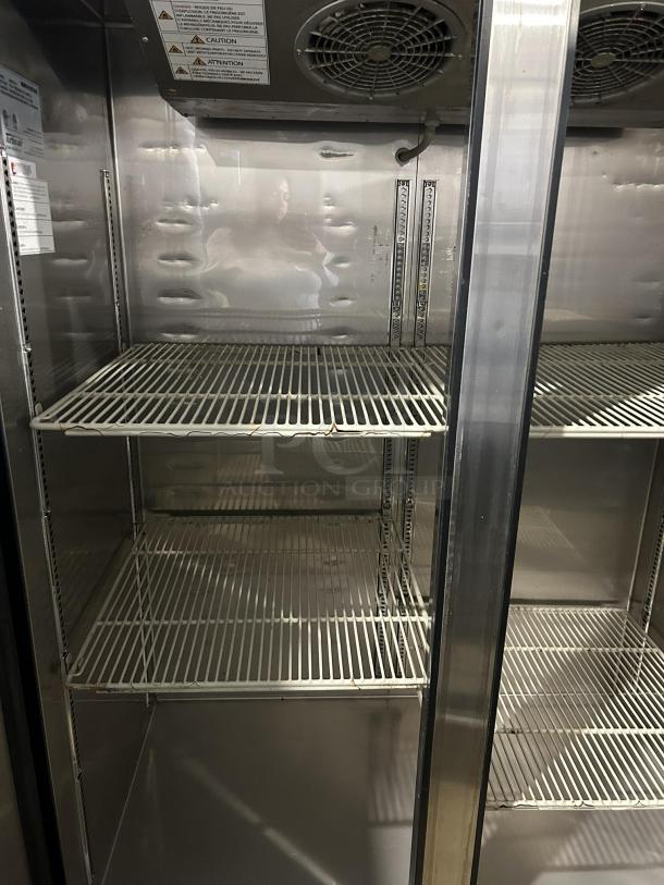 Turbo Air M3F47-2-N stainless steel reach-in freezer, 52", excellent condition, interior fan, shelving, tested and working.