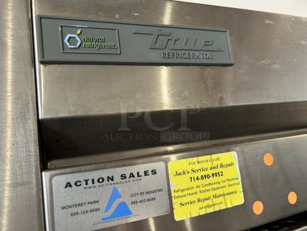 True T-43-HC refrigerator in excellent condition, stainless steel, natural refrigerant, labels for service and sales visible.