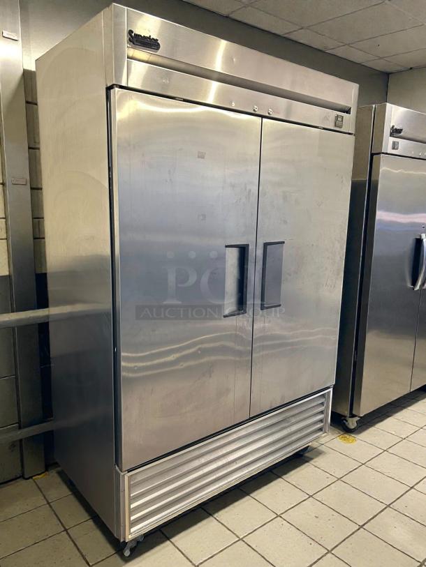 True TS-49-HC 54" two-section reach-in refrigerator, stainless steel, two solid doors, tested and working condition.