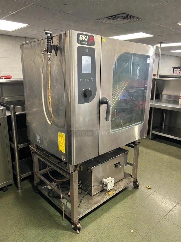 BKI ETE102R combination oven, electric boilerless, good condition, tested and working, stainless steel, control panel visible.