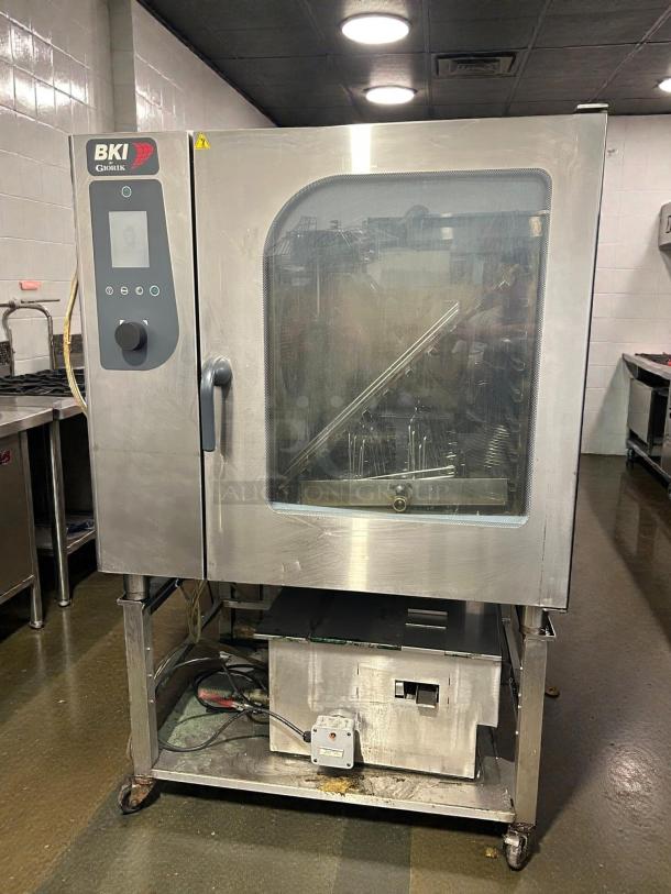 BKI ETE102R combination oven, stainless steel, boilerless, tested and working. Control panel and door with glass window visible.