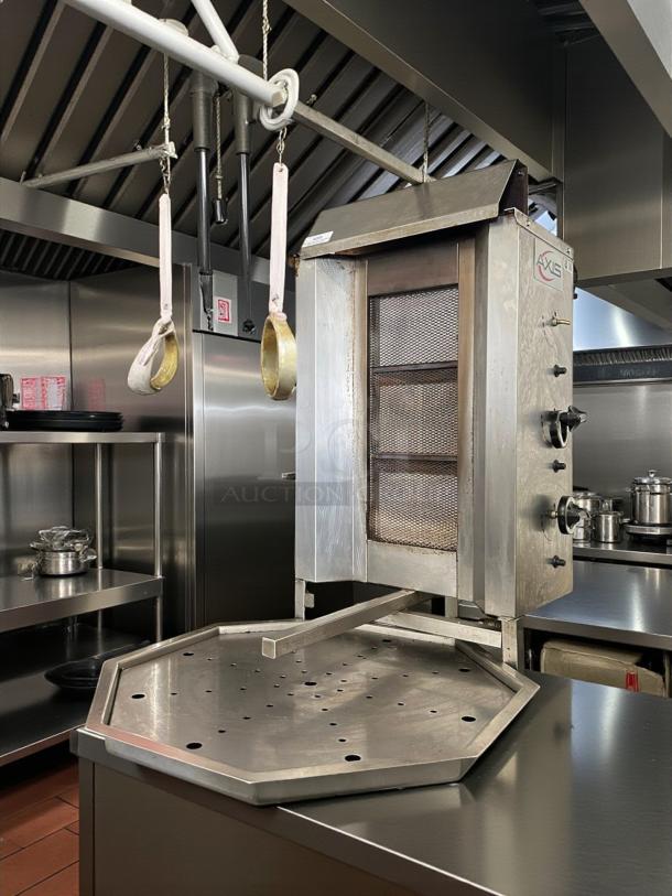 Axis AX-VB4 gas vertical broiler, 176 lb capacity, in great condition with infrared burners, visible Axis branding.