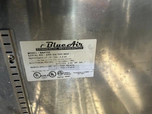 Blue Air BAPT60 label showing model, serial number ARR-BAPT60-0034, electrical ratings, and refrigerant details.