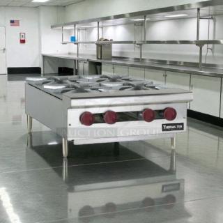Therma-Tek TCHP24-4-LP 24" propane hot plate with four burners, silver, tested, working, excellent condition.