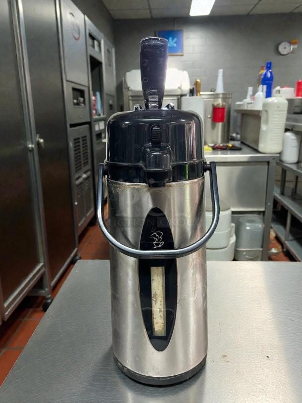 Newco Koffee Kup #KKSG 121282 airpot brewer in excellent condition. Stainless steel with black lid, tested and working.