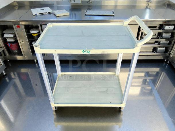 Choice Purple Utility Cart, 42"x20", two shelves, unassembled, new in box. Durable design, ideal for bussing tasks.