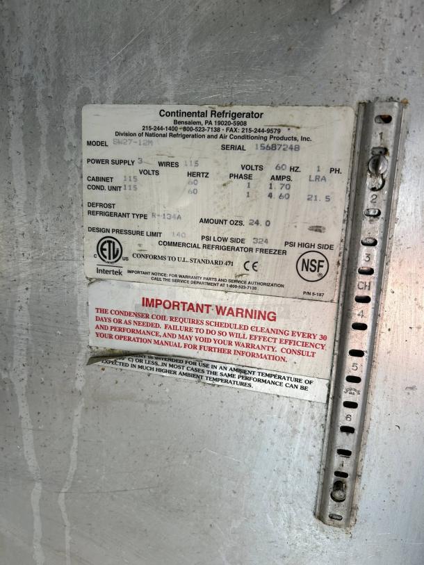 Continental Refrigerator SW27N12M label with model, serial, and technical details; includes cleaning warning.