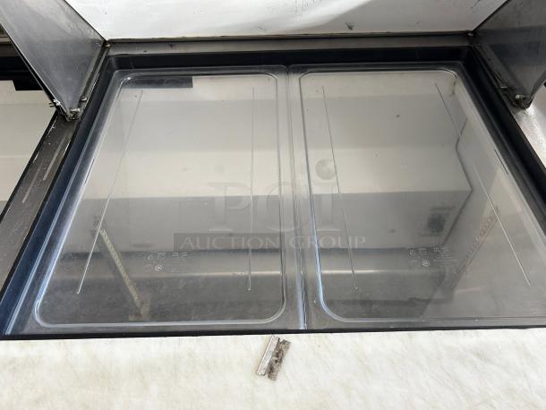 True TSSU-60-12M-B-HC Mega Top Sandwich/Salad Prep Table, 60", refrigerated base, ADA compliant, good condition.