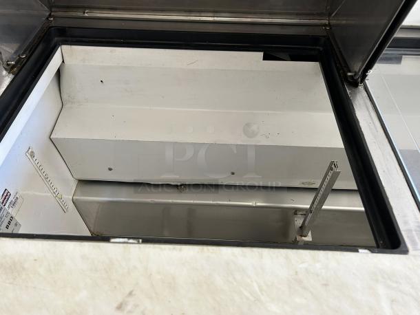 True TSSU-60-12M-B-HC Mega Top Prep Table, 60", refrigerated base, good condition, interior view, visible labels.