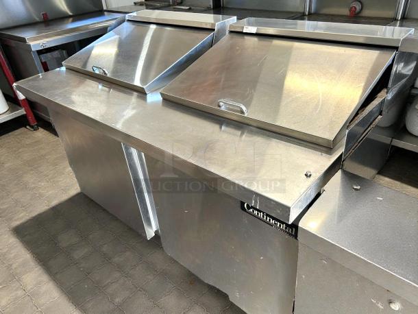 Continental Refrigerator DL60-16C sandwich unit in stainless steel, features dual lids, excellent condition, tested working.