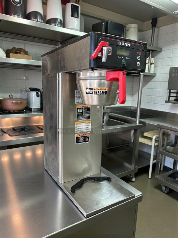 Bunn ICB-DV Automatic Coffee Brewer for Thermal Servers in great condition, stainless steel, tested and working, visible warning labels.