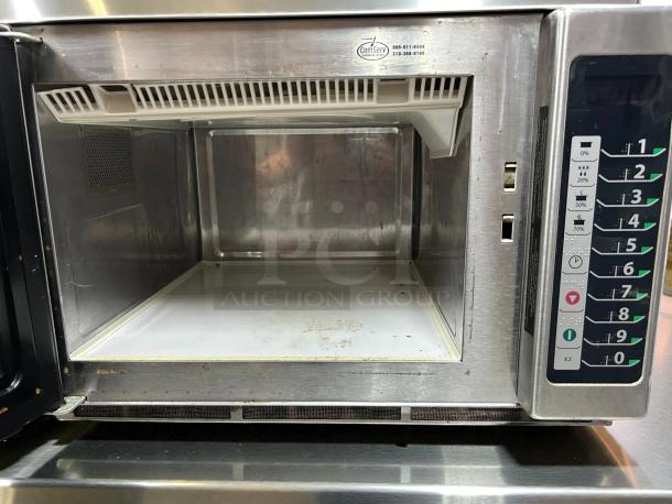 Menumaster MCS10TS commercial 1000W microwave oven, medium volume, stainless steel, tested and working, keypad interface visible.