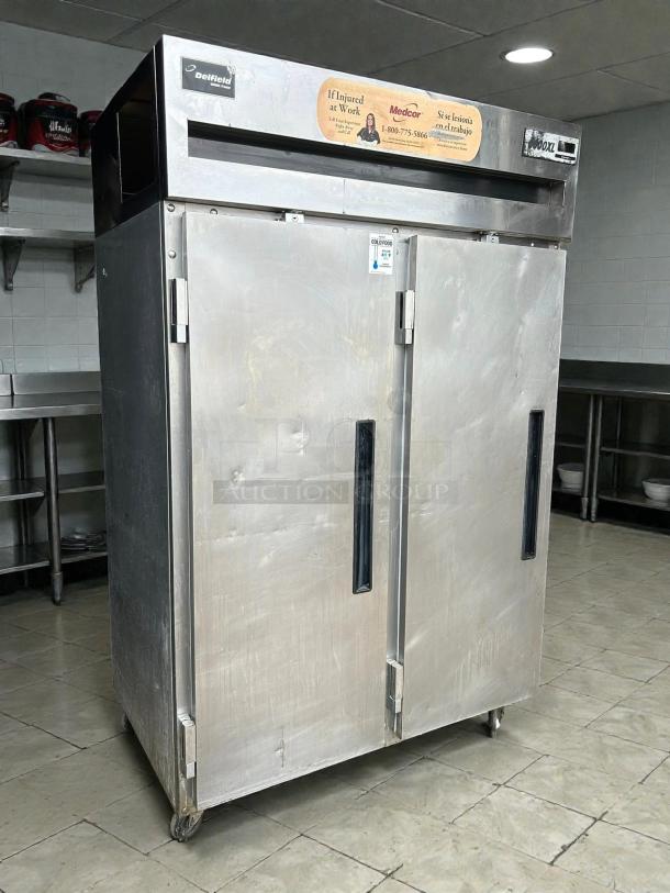 Delfield 6151XL-S 51" reach-in freezer with two solid doors. Tested and working. Visible wear, solid construction, 115v power.