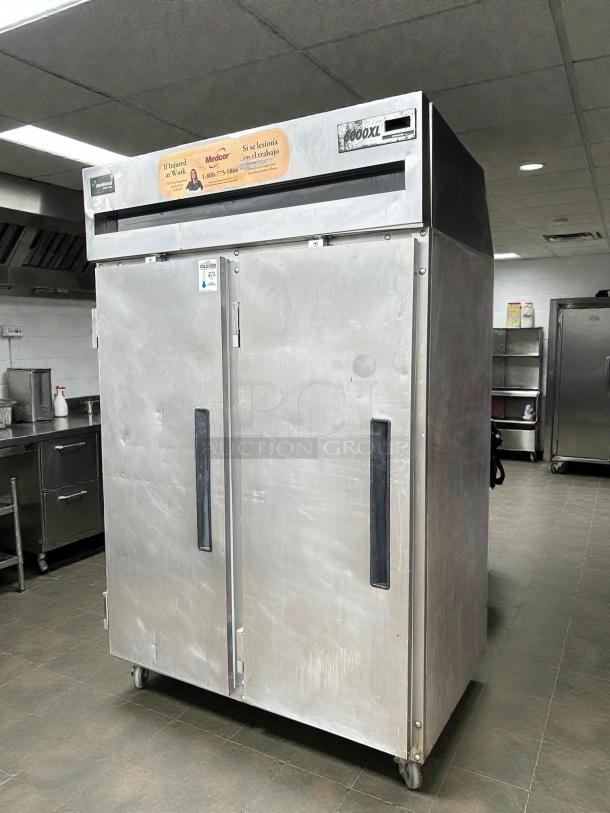 Delfield 6151XL-S 51" reach-in freezer with two solid doors. Tested and working, 115v, visible brand label.