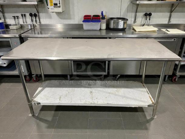 Advance Tabco TT-306 72" stainless steel worktop table, with lower shelf, minor surface wear, tested and working.