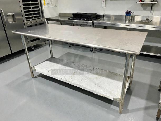 Advance Tabco Model TT-306 stainless steel worktop table, 72” length, tested and working. Includes lower shelf; good condition.
