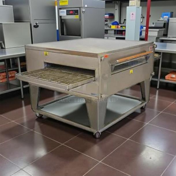 XLT 3255 Series Conveyor Oven, 32" conveyor, 55" chamber, tested, working. Good condition, suitable for NG/LP/electric use.