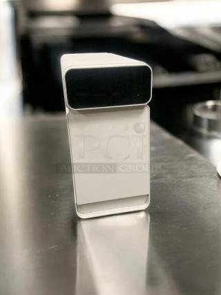 White countertop water dispenser with hot and cold functions, in outstanding condition. Fully tested and working.