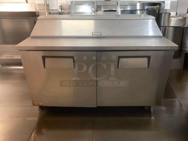 True TSSU-60-16 prep table, 60", stainless steel, two-door. Tested, working, great condition. Made in O’Fallon, MO, USA.