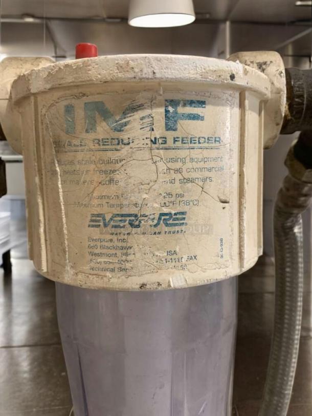 Pentair Everpure water filtration system, MC²/4000 Series, with IMF feeder. Good condition, visible logo and text on casing.