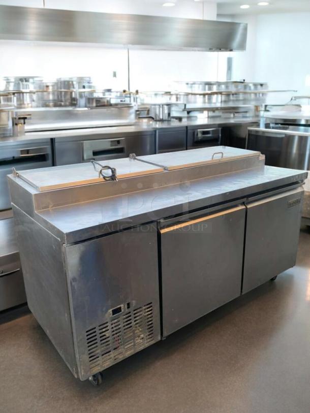 Stainless steel Mega Top Refrigerated Prep Table, great condition, 115V, fully tested, model shown in commercial kitchen.