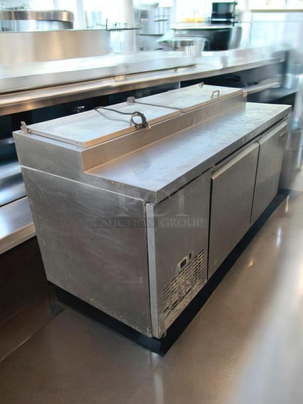 Stainless steel Mega Top Refrigerated Prep Table, great condition, 115V, fully tested and working, with multiple compartments.