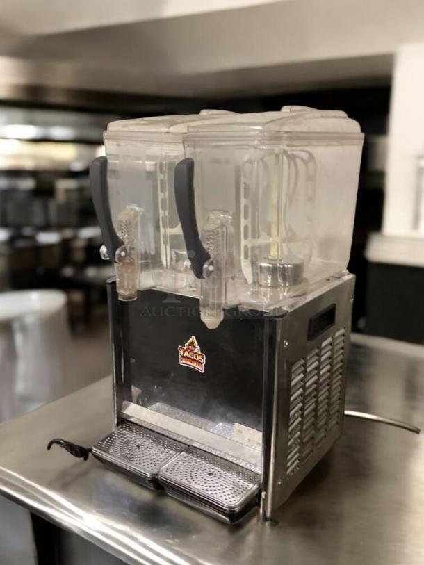 Dual-Tank Commercial Beverage Dispenser, 115V AC, fully tested, prime condition, clear tanks, metal body, drip trays.