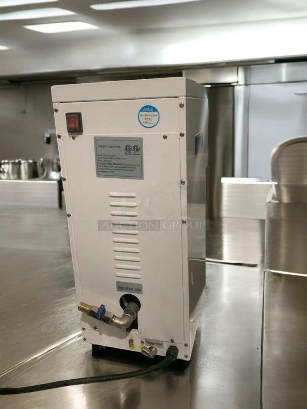 Naixer NDF-XCZQ2W steam machine, 240V, outstanding condition, fully tested. Features water inlet, steam outlet, and labels.