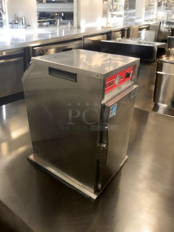 Witco electric warming cabinet, stainless steel, great condition, 120V, tested and working, visible control panel.