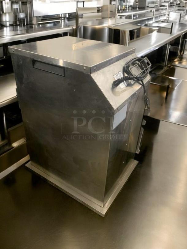 Electric Witco warming/holding cabinet in great condition, 120V, fully tested and working, with visible power cord.
