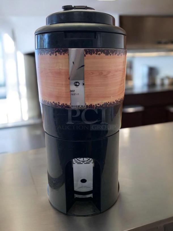 Commercial coffee dispenser by The Coffee Bean & Tea Leaf, great condition, black with brand wrap, fully tested and working.