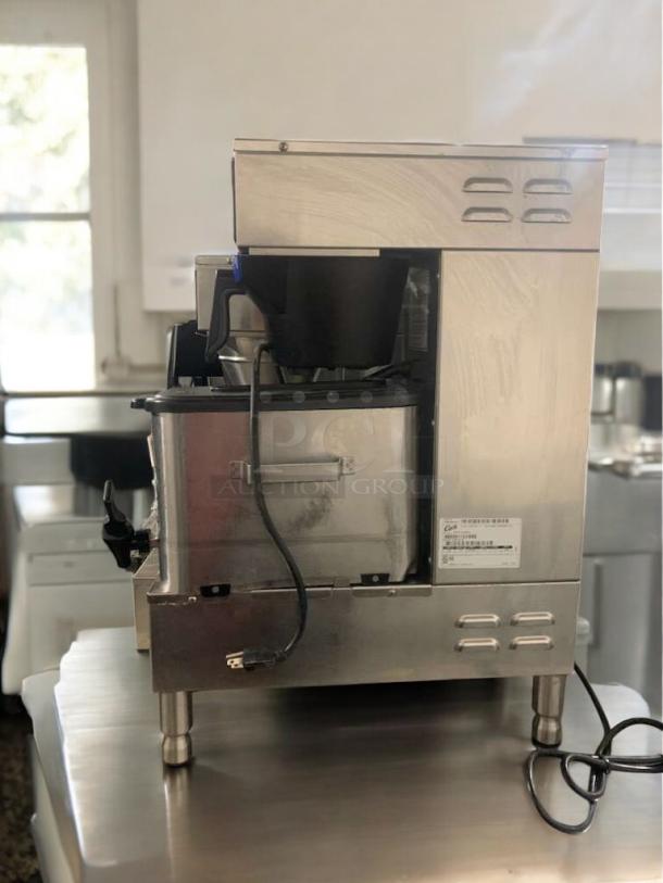 Wilbur Curtis FTT310000 coffee brewer in immaculate condition, 120V, fully tested, stainless steel, visible brand label.