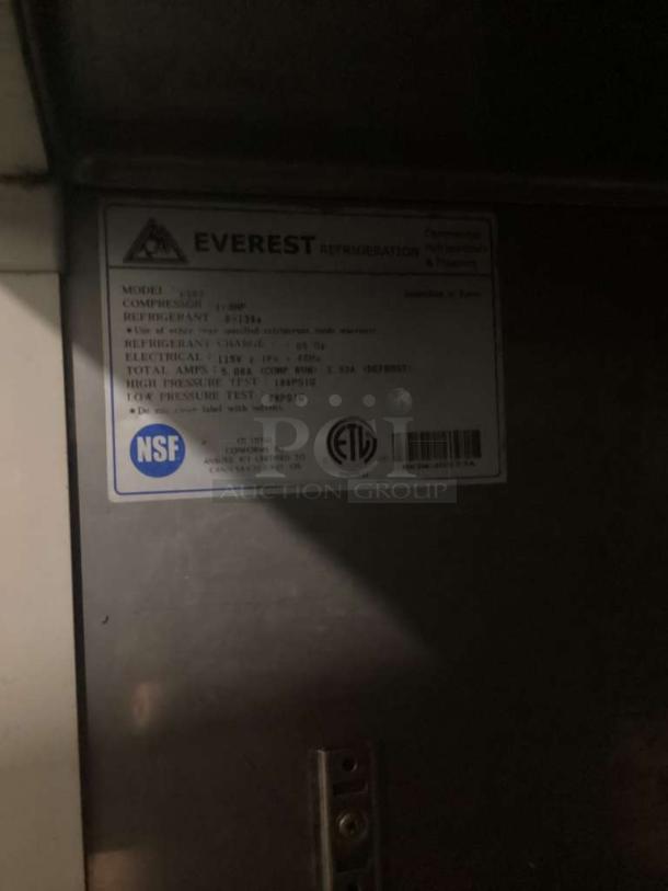 Everest ESR2 Reach-In Refrigerator label, model ESR2. NSF certified, 115V, 1 HP compressor, R-134a refrigerant. Immaculate condition.