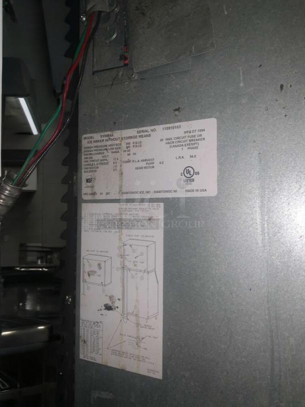 Manitowoc SY0654A ice maker back panel with model label, serial number, and specifications. Fully tested, working condition.